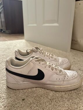 Nike White Sneakers with Black Swoosh Low-Top